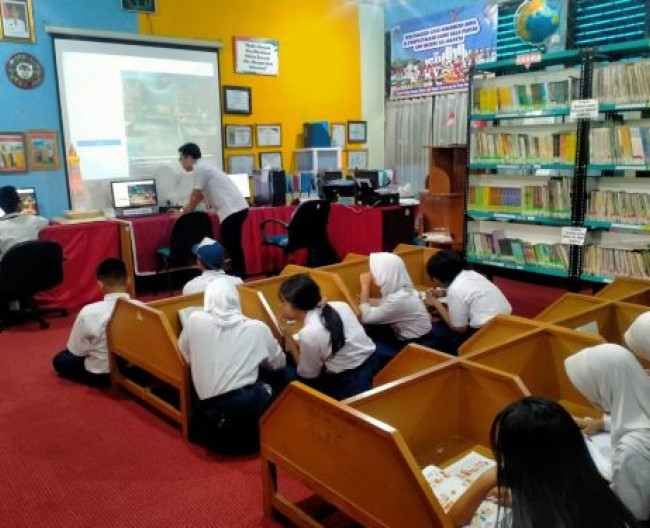 Bimbingan atau Pelatihan Pemustaka Tentang cara Menggunakan otomasi digital slims9